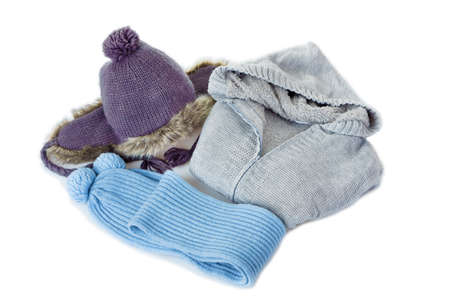 Set of women's winter clothes on whiteの写真素材