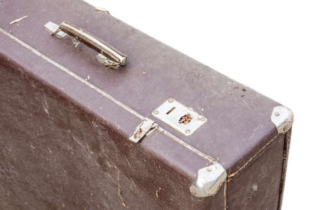 Old suitcase isolated on whiteの写真素材