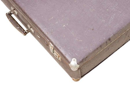 Old suitcase isolated on whiteの写真素材