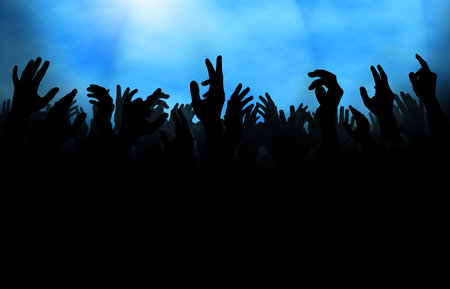 Silhouette of  a crowd with raised hands, either at a concert or on the dance floor in a club.