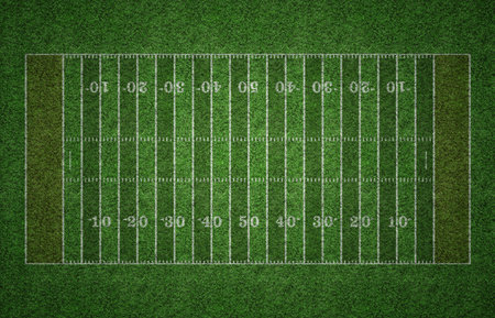 Green grass American football field with white lines marking the pitch.