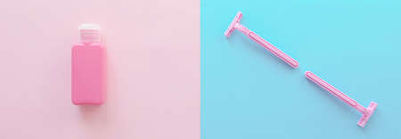 Two Female Razors and Bottle On The Pastel Background Light Pink and Blue Colors Mimimal Style Top View Flat Lay Long Bannerの写真素材