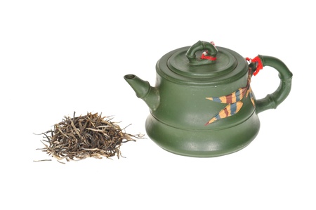 Chinese Green Color Clay Teapot With Tea Leavesの写真素材