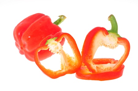 Slices Of Red Capsicum On White Backgroundの写真素材