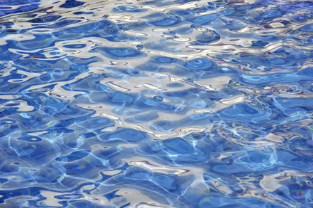 Abstract Image Of Ripples Of Water In A Swimming Pool 