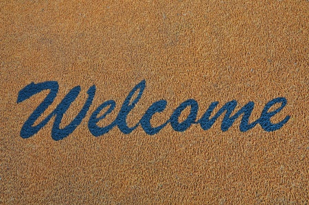 Blue Welcome Sign On A Carpetの写真素材