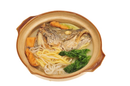 Serving On Claypot Fish Head Noodleの写真素材