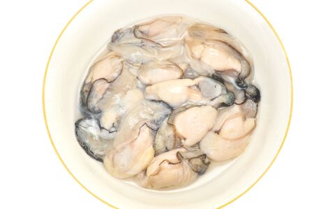 Bowl Of Fresh Oyster Meatの写真素材