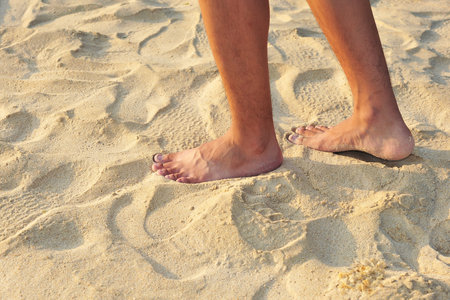 Barefoot Walking On Sand