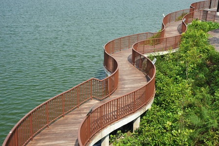 Winding Wooden Bridge Along The Coastlineの写真素材