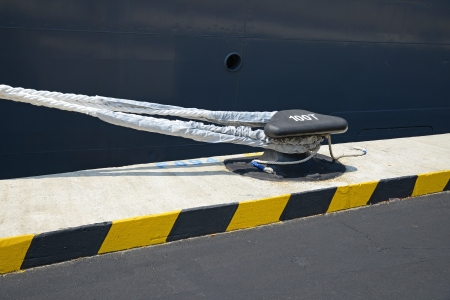 Dockyard Cleat And Ship Rope Tied To Itの写真素材