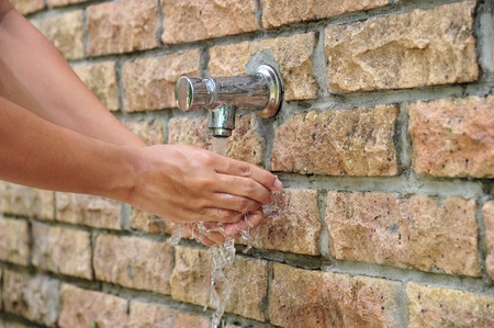 Washing Hands At Outdoor Wash Areaの写真素材