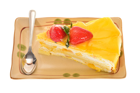 A Slice Of Mango Favored Cake With Strawberry Dressingの写真素材