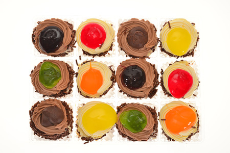 Colorful Mini Cup Cakes With Fruit Cream Toppingの写真素材