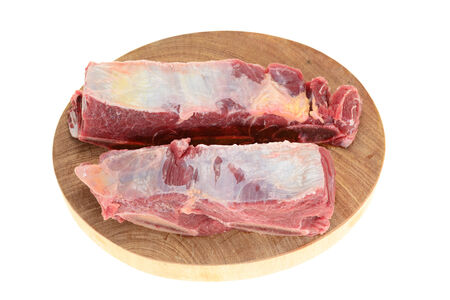 Slices Of Raw Beef On A chopping Boardの写真素材
