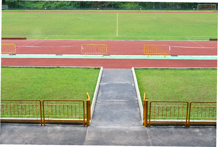 Grandstand View Of Stadium Running Track And Fieldの写真素材