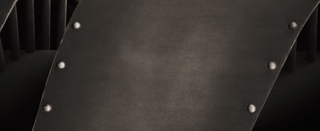 Grey metal with rivet background, black and white texture closeupの写真素材
