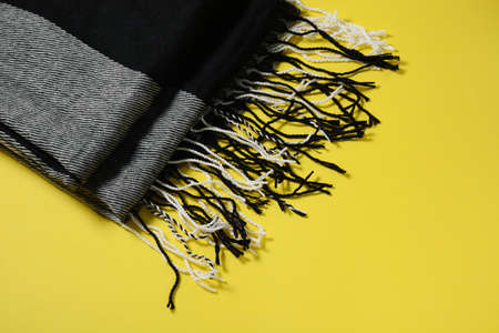 Men s scarf close-up on yellow backgroundの写真素材