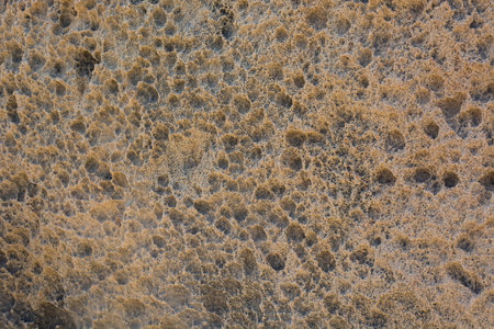 Stone surface brown background, uneven rock texture