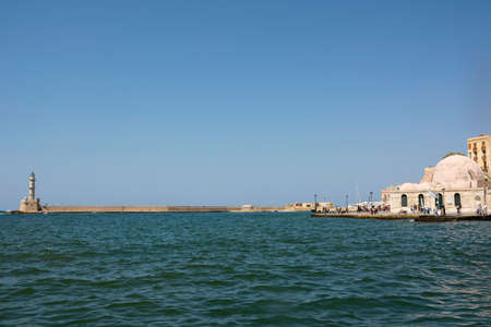 Greece, Chania - August 09, 2018: Venetian Harbor and lighthouse of Chania Old Town. Crete island of Greeceのeditorial素材