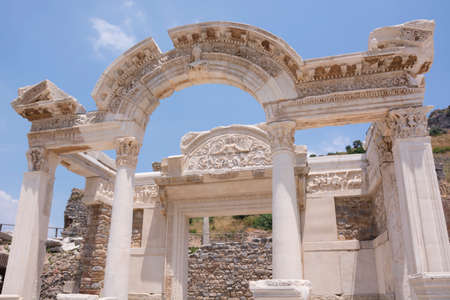 Temple of Hadrian ruins in Ephesus ancient city at sunny day, Izmir, Turkey. Turkish famous travel landmarkの写真素材