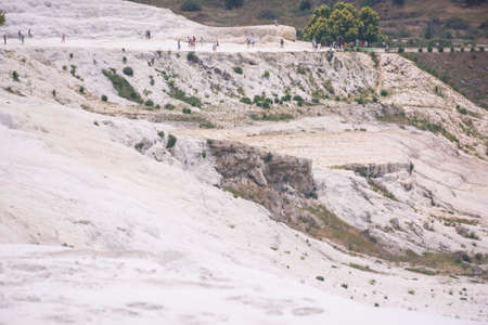 Turkey, Pamukkale - June 22, 2019. Pamukkale travertine pools and terraces white carbonate mineral at ancient Hierapolisのeditorial素材