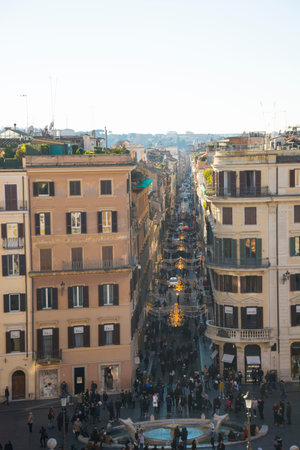 Italy, Rome - December 10, 2018. Crowd of people sitting on city stairs at square of Spain back behind top view. Concept of rest and meet in the cityのeditorial素材