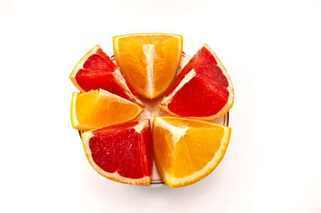 Splited oranges on the white backgroundの写真素材