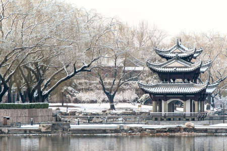 Chinese pavilion in the snow, a park of Beijingの写真素材