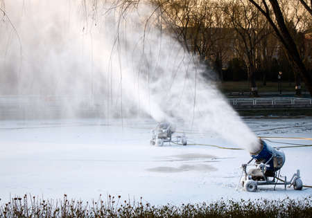Snow maker is working in winterの写真素材