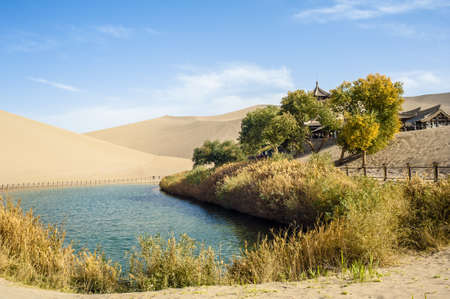 Crescent Spring and Mingyue Pavilion in Autumn, Dunhuang of Chinaの写真素材