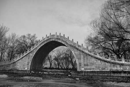 Chinese style arch bridge in Summer Palace.の写真素材