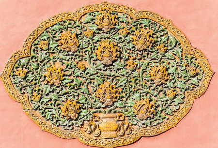 Carved flowers on the red wall of Forbidden City, Beijingのeditorial素材