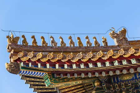 Immortal and beasts on the eaves of Taihe Hall, Forbidden City, Beijingの写真素材