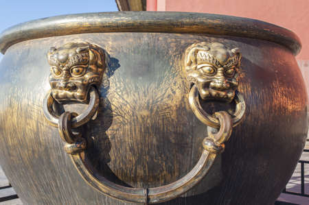 Bronze handle of the water vat in Forbidden Cityの写真素材