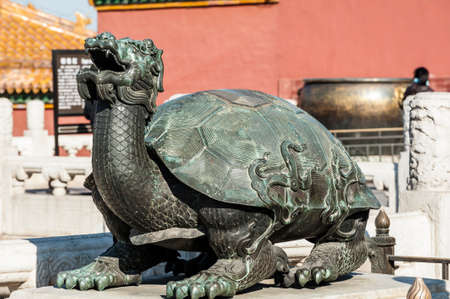 A bronze tortoise statue in Forbidden City, Beijingの写真素材