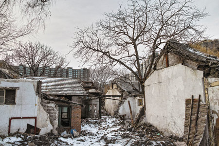 Demolished old house and the new residential buildingの写真素材