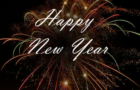 Happy New Year on the fireworks backgroundの写真素材