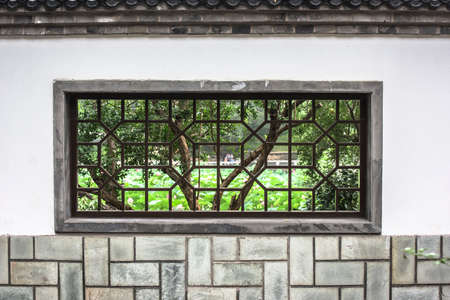 Traditional window on the wallの写真素材