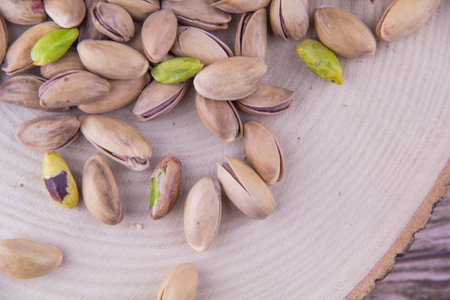 Pistachio nuts - Isolated on a white background.の写真素材