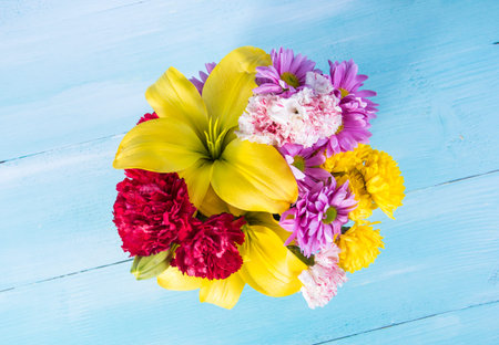 flowers top white wooden background