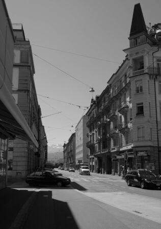 Black and white of street in Lucerne, Switzerland with Alps in the backgroundのeditorial素材