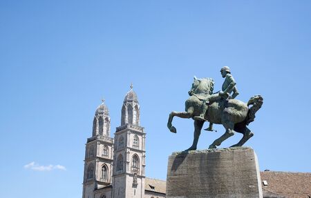 Grossmunster Cathedral and Statue of Burgermeister Hans Waldmann Zurich Switzerlandの写真素材