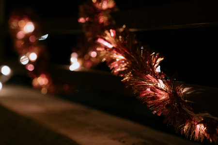 Christmas lights garland on the street. Bokeh background.の写真素材