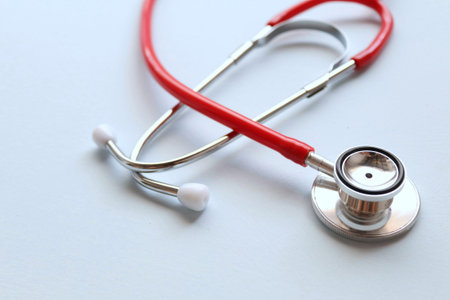 Stethoscope on white background, closeup. Health care concept