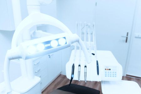 Dentist chair and equipment in modern dental clinic. Dentistry background