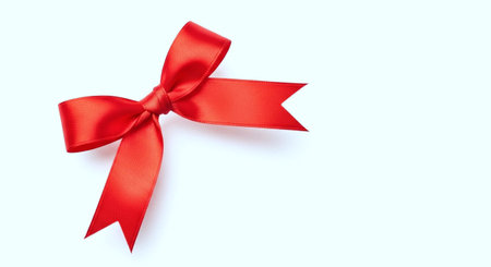 Red ribbon bow isolated on white background with copy space for your text