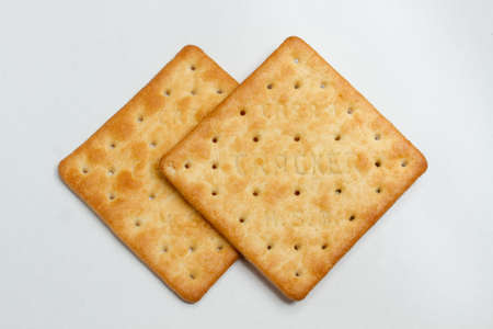 Cream crackers with white backgroundの写真素材