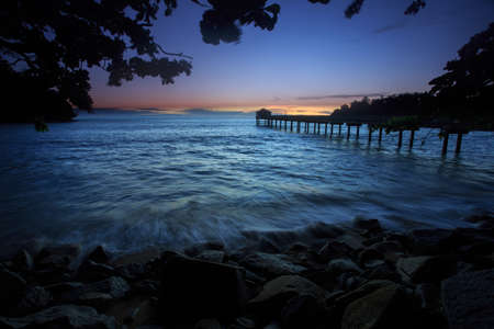 view of a jetty near seasideの写真素材