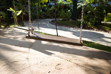wooden cradle in parkの写真素材